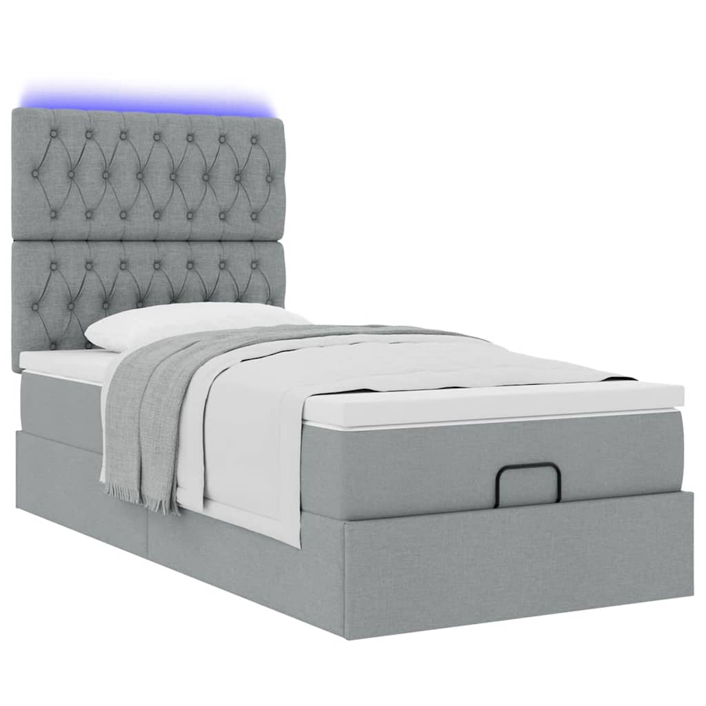 Ottoman bed met matras en LED's 80x200cm stof lichtgrijs