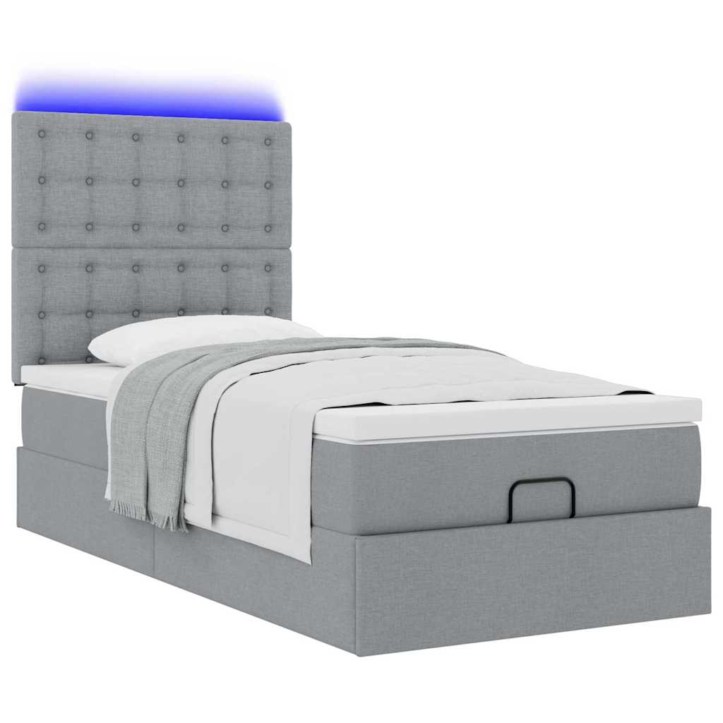 Ottoman bed met matras en LED's 90x200cm stof lichtgrijs